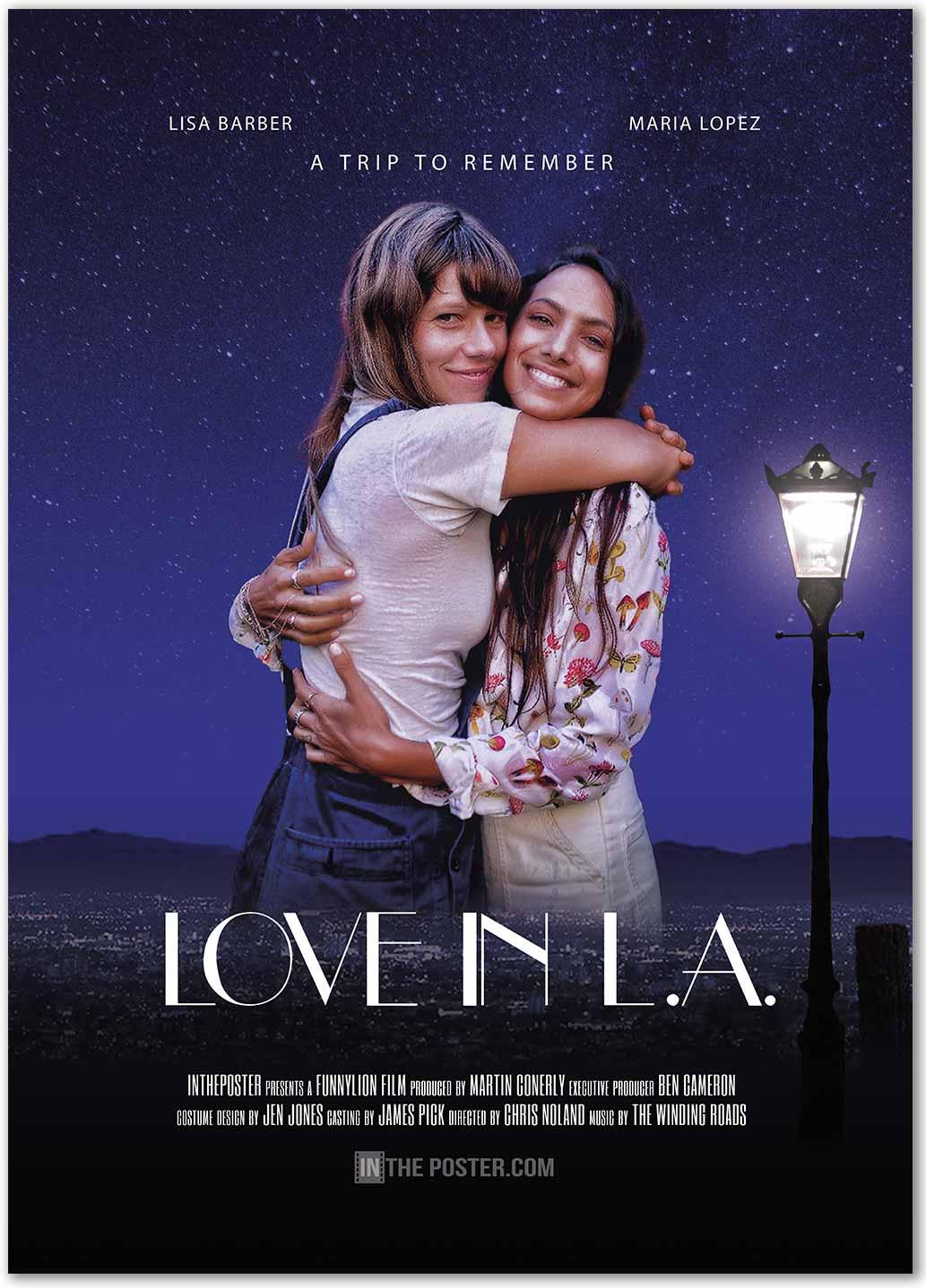 Love In LA - A smiling couple hugs, in the background is the Los Angeles skyline with a lamp post, city lights and mountains