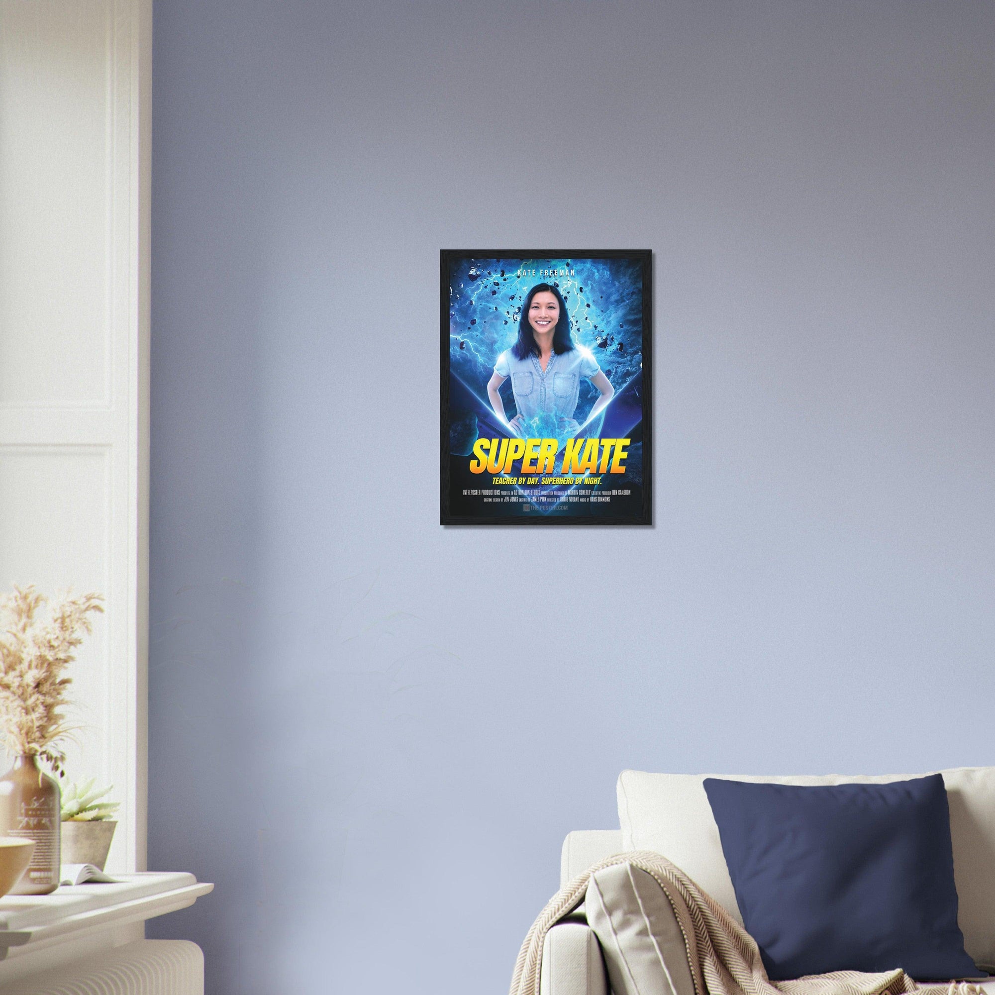 The Super Hero Custom Movie Poster design in a black frame in size small, on the wall above a beige sofa and blue cushion