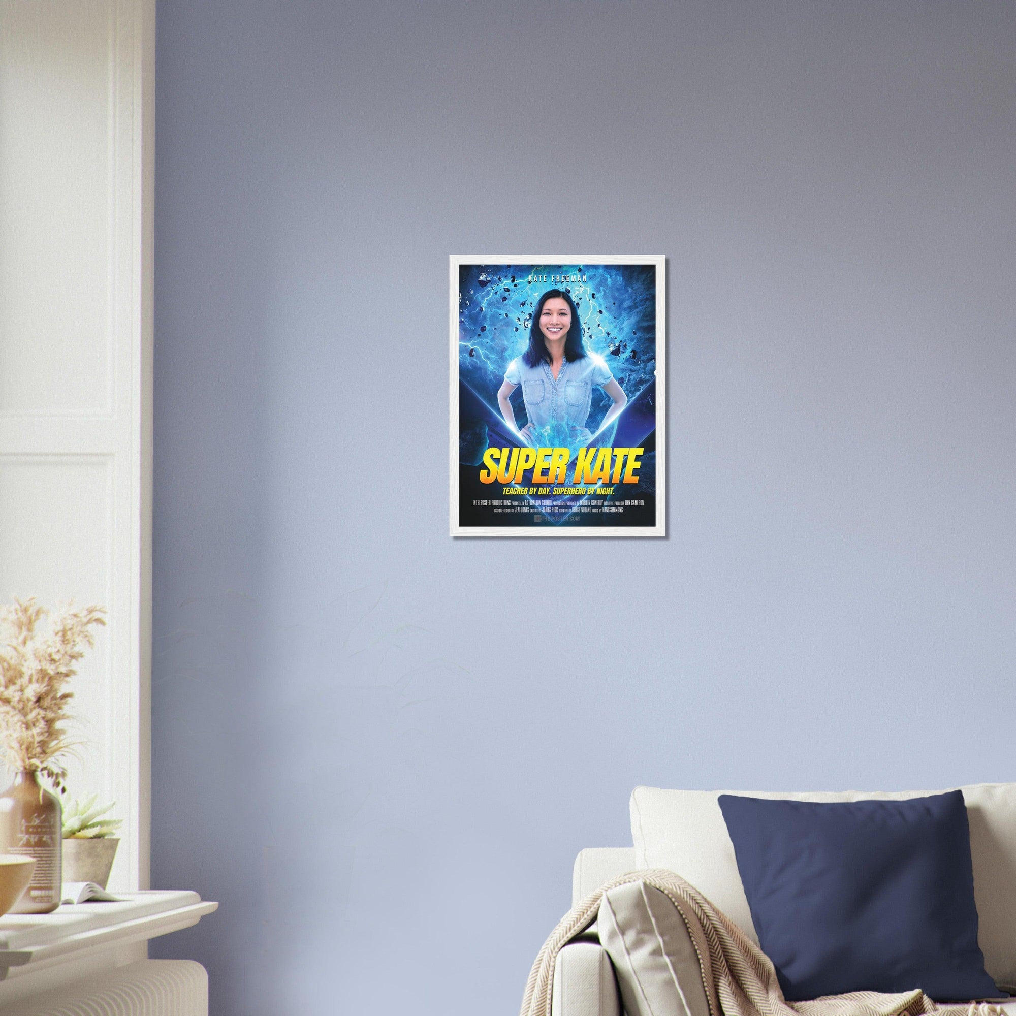 The Super Hero Custom Movie Poster design in a white frame in size small, on the wall above a beige sofa and blue cushion