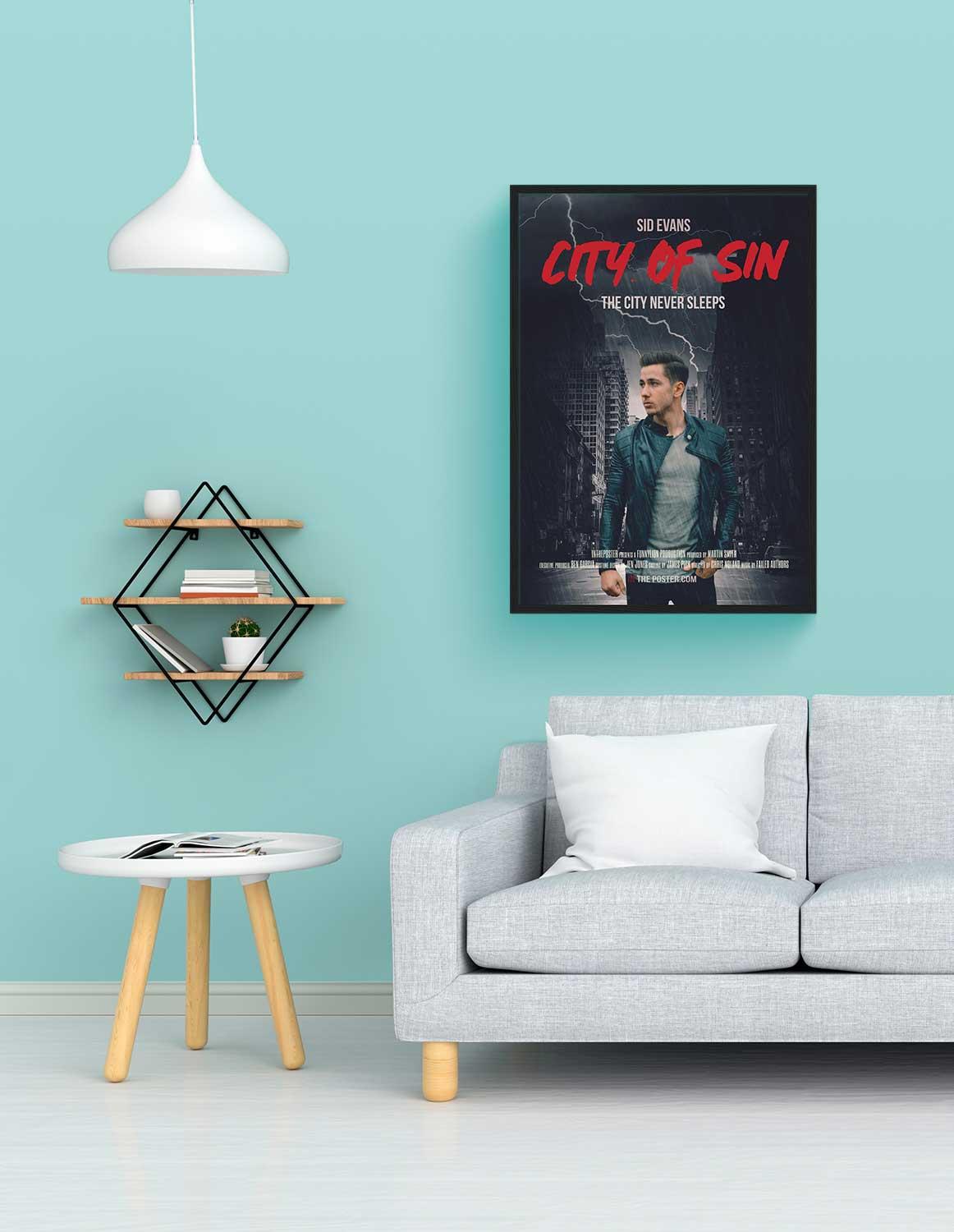 A personalized film noir movie poster in regular size in a black frame above a grey sofa