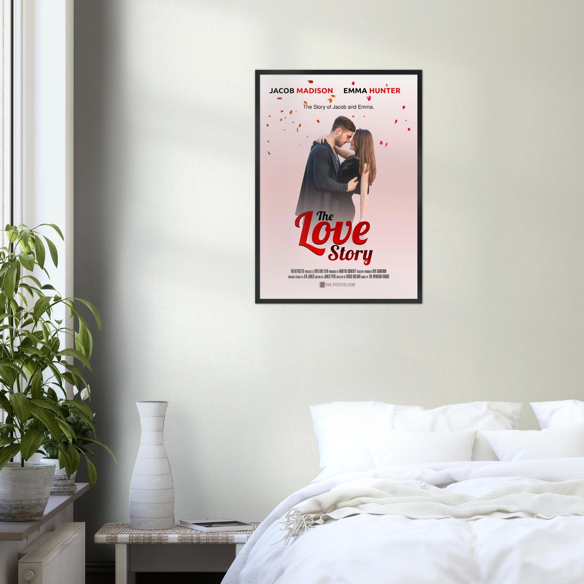 A bedroom wall with a regular black frame with a film poster called The Love Story