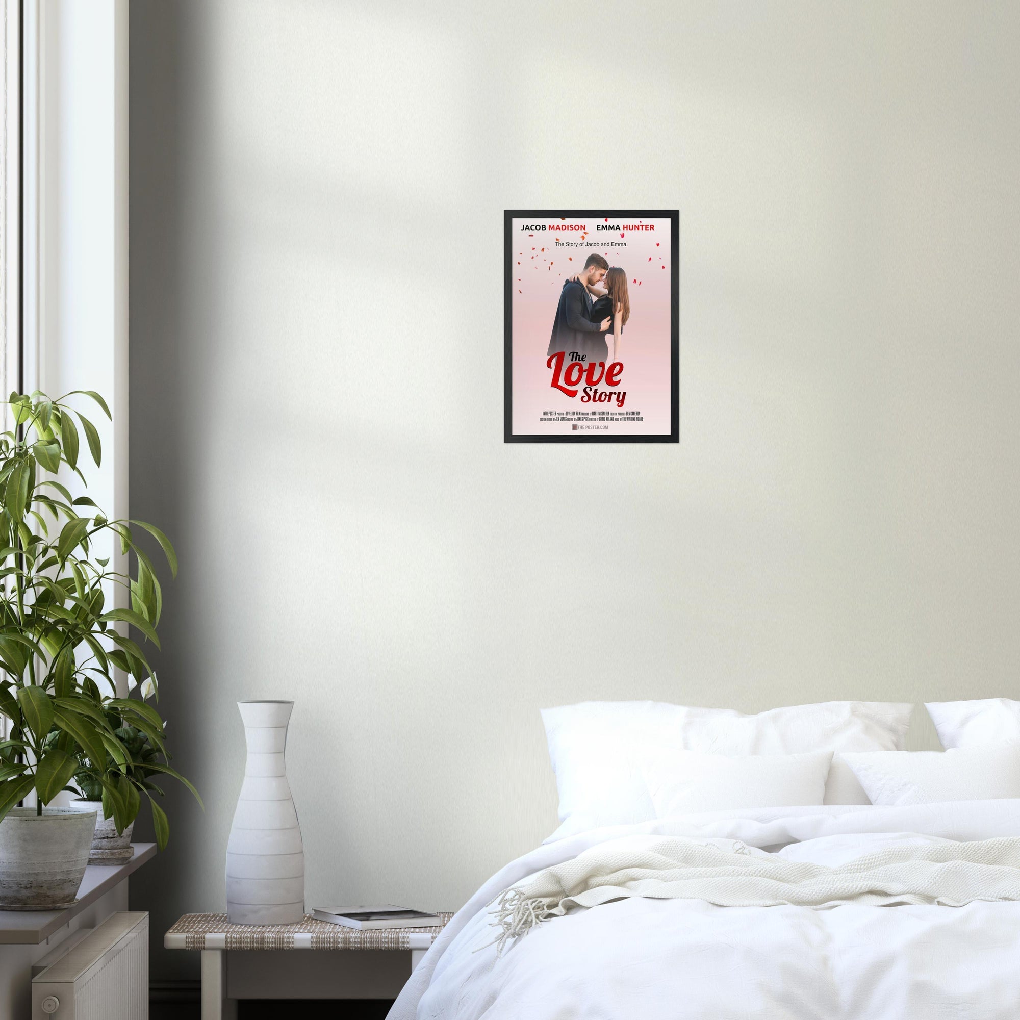A bedroom wall with a small black frame with a film poster called The Love Story